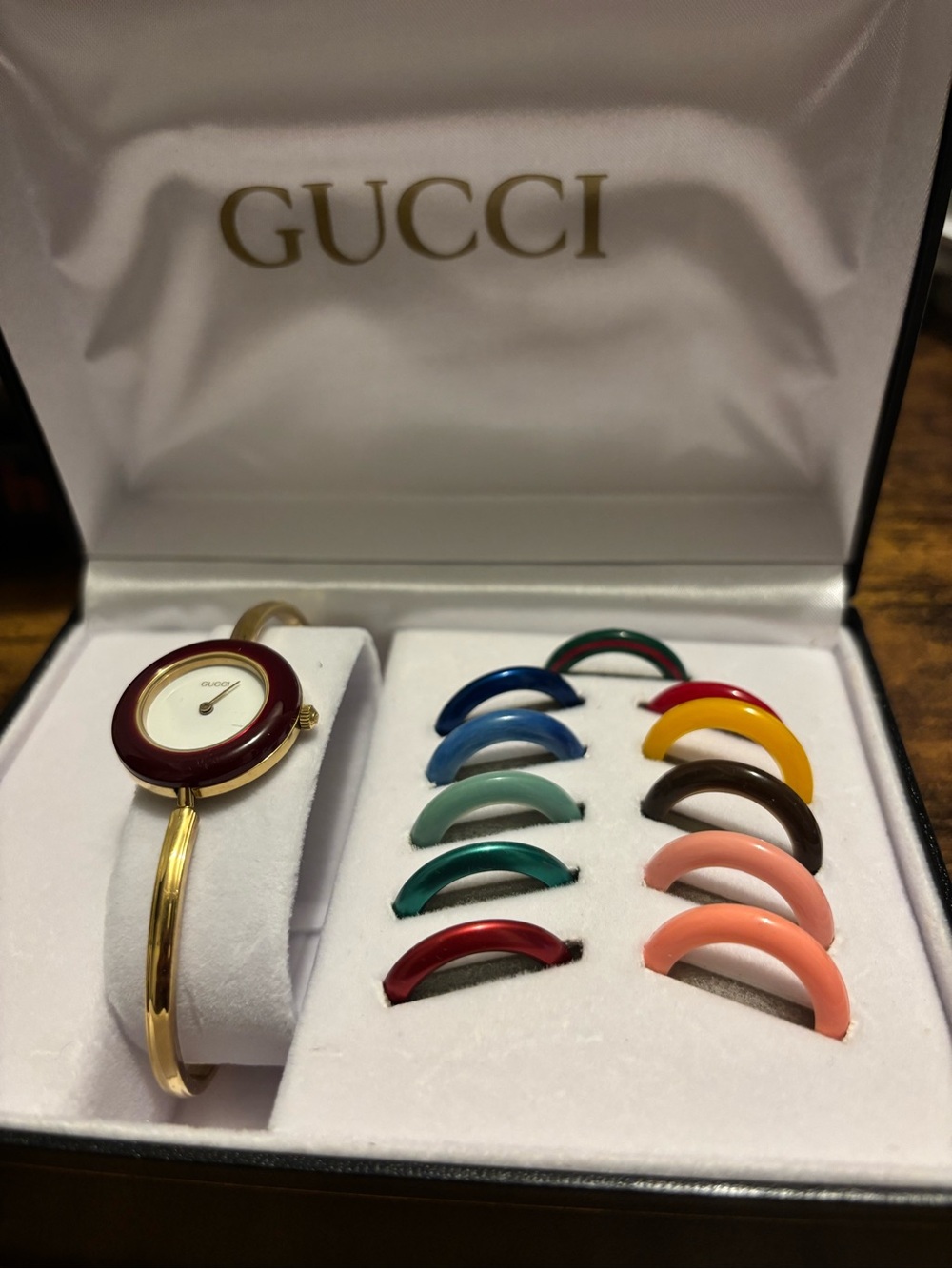 GUCCI Gold Bangle Watch with Interchangeable Color Bezels